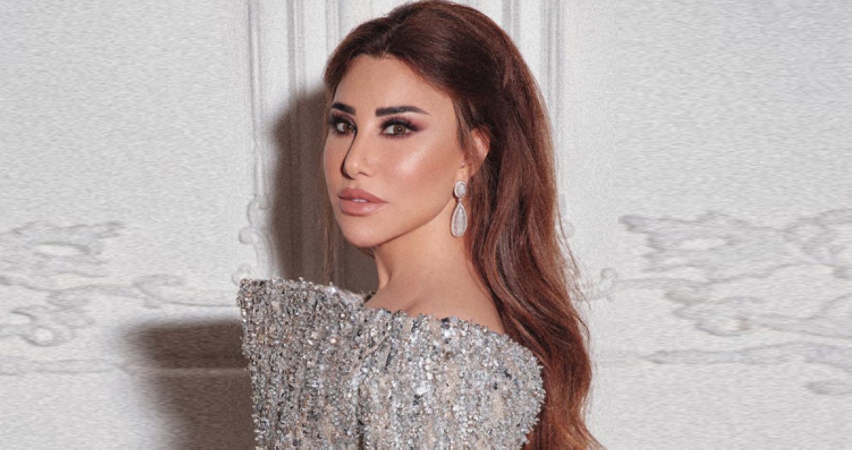 نجوى-كرم-تعيد-معجباً-إلى-قاعة-الحفل-في-سيدني